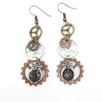 Bijoux steampunk suspendus aux oreilles