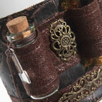 Brassard muni d’une fiole steampunk