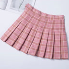 Jupe courte plissée taille haute