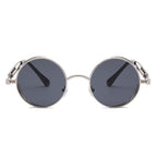 Lunettes de forme ronde en métal contre le soleil