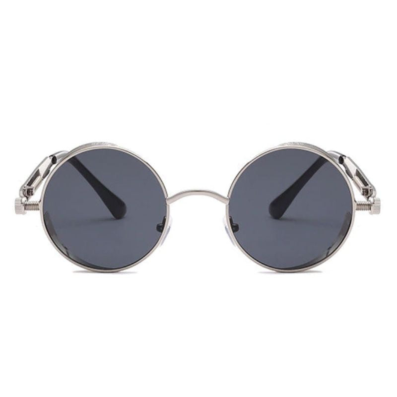 Lunettes de forme ronde en métal contre le soleil