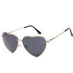 Lunettes solaires cœur de couleur dorée