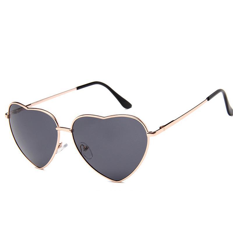 Lunettes solaires cœur de couleur dorée