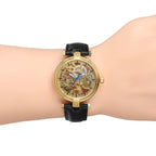 Montre femme squelette avec bracelet en cuir